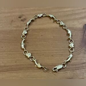Beverly Hills Gold: 14k. Yellow gold Vintage heart and dolphin link bracelet .
